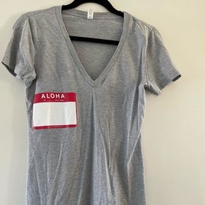 Sticks and Pohaku name tag shirt